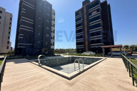 LEVANTEN Mezitli'de Sıfır, Havuzlu, Site İçi 2+1 Kiralık Daire