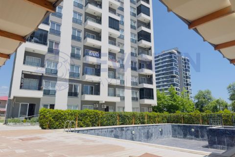 LEVANTENDEN ARPAÇBAHŞİŞTE HAVUZLU SIFIR 1+1 DAİRE