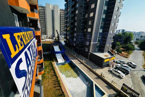 LEVANTENDEN TÖMÜKTE DENİZE YÜRÜME MESAFESİNDE AQUA HAVUZLU 2+1