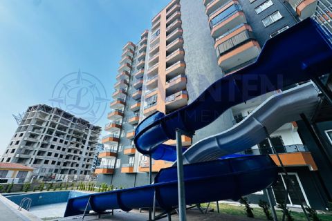LEVANTENDEN TÖMÜKTE DENİZE YÜRÜME MESAFESİNDE AQUA HAVUZLU 2+1