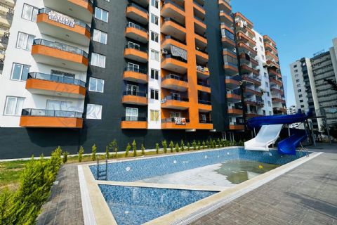 LEVANTENDEN TÖMÜKTE DENİZE YÜRÜME MESAFESİNDE AQUA HAVUZLU 2+1